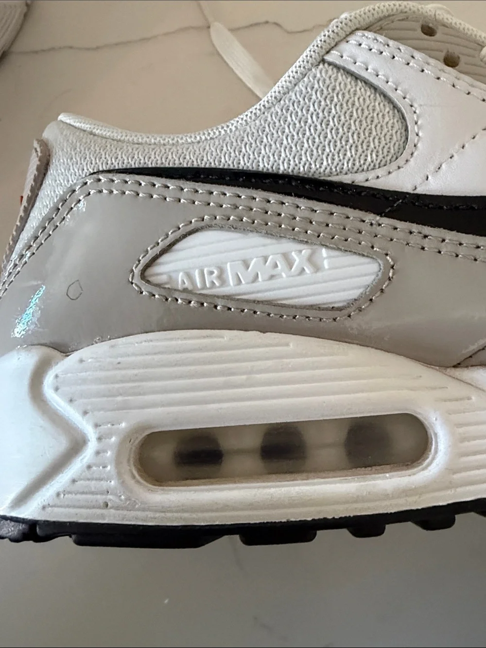 Nike Women’s Air Max 90 Light Iron White/Grey with Black Swoosh and Red Accents